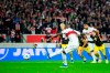 Stuttgart's Serhou Guirassy scores his side's second goal during the German Bundesliga soccer match between Stuttgart and Borussia Dortmund, at the MHPArena in Stuttgart, Germany, Saturday, Nov. 11, 2023. (Tom Weller/dpa via AP)