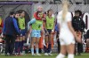 OL Reign forward Megan Rapinoe, center in red sleeves, celebrates with teammates as she is carried on the back of goalkeeper Laurel Ivory during the first half of the NWSL Championship soccer game against NJ/NY Gotham, Saturday, Nov. 11, 2023, in San Diego. (AP Photo/Gregory Bull)