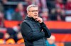 Berlin's head coach Urs Fischer attends the German Bundesliga soccer match between Bayer 04 Leverkusen and Union Berlin in Leverkusen, Germany, Sunday, Nov. 12, 2023. (David Inderlied/dpa via AP)