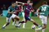 Barcelona's Robert Lewandowski fights for the ball with Alaves' Abdel Abqar during the Spanish La Liga soccer match between Barcelona and Alaves at the Montjuic stadium in Barcelona, Spain, Sunday Nov. 12, 2023. (AP Photo/Joan Monfort)