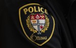 An Ottawa man was arrested near Toronto this weekend after he was allegedly caught on video inciting hatred and expressing antisemitic views. A close-up of an Ottawa Police officer’s badge is seen on Thursday, April 28, 2022 in Ottawa. THE CANADIAN PRESS/Adrian Wyld