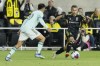Columbus Crew's Alexandru Matan, right, dribbles past Atlanta United's Thiago Almada, left, during the second half of an MLS playoff soccer match Sunday, Nov. 12, 2023, in Columbus, Ohio. (AP Photo/Jay LaPrete)