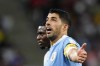 FILE - Uruguay's Luis Suarez reacts during the World Cup group H soccer match between Ghana and Uruguay, at the Al Janoub Stadium in Al Wakrah, Qatar, Friday, Dec. 2, 2022. Suárez returned to Uruguay's national team on Monday, Nov. 13, 2023 for two South American World Cup qualifying games. (AP Photo/Manu Fernandez)