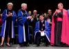 FILE - Judge Maryanne Trump Barry, far left, applauds during a commencement ceremony at Seton Hall University School of Law, Friday May 25, 2007, in Newark, N.J. Supreme Court Associate Justice Samuel A. Alito who was sitting between Monsignor Robert Sheeran, second from left, and Archbishop John Myers, right, received an Honorary Degree and was the keynote speaker. Barry, former President Donald Trump's older sister and a former federal judge in New Jersey, has died at the age of 86. (AP Photo/Tim Larsen, File)