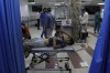FILE - A wounded Palestinian boy arrives to the emergency room of the al-Shifa hospital, following Israeli airstrikes on Gaza City, central Gaza Strip, Tuesday, Oct. 17, 2023. Gaza's Shifa Hospital has become the focus of a days-long stalemate in Israel's war against Hamas. Israel claims Hamas uses the facility for military purposes and has built a vast underground command center below the hospital. Since Israel declared war against Hamas, its forces have moved in on Shifa. But hundreds of doctors and patients remain inside. (AP Photo/Abed Khaled, File)