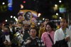 Demonstrators march with a picture of Aguascalientes state electoral court magistrate Jesus Ociel Baena in Mexico City, Monday, Nov. 13, 2023. The first openly nonbinary person to assume a judicial position in Mexico was found dead in their home Monday in the central Mexican city of Aguascalientes after receiving death threats because of their gender identity, authorities said. (AP Photo/Eduardo Verdugo)