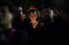 A demonstrator holds a candle during a protest in Mexico City, Monday, Nov. 13, 2023. The first openly nonbinary person to assume a judicial position in Mexico was found dead in their home Monday in the central Mexican city of Aguascalientes after receiving death threats because of their gender identity, authorities said. (AP Photo/Eduardo Verdugo)