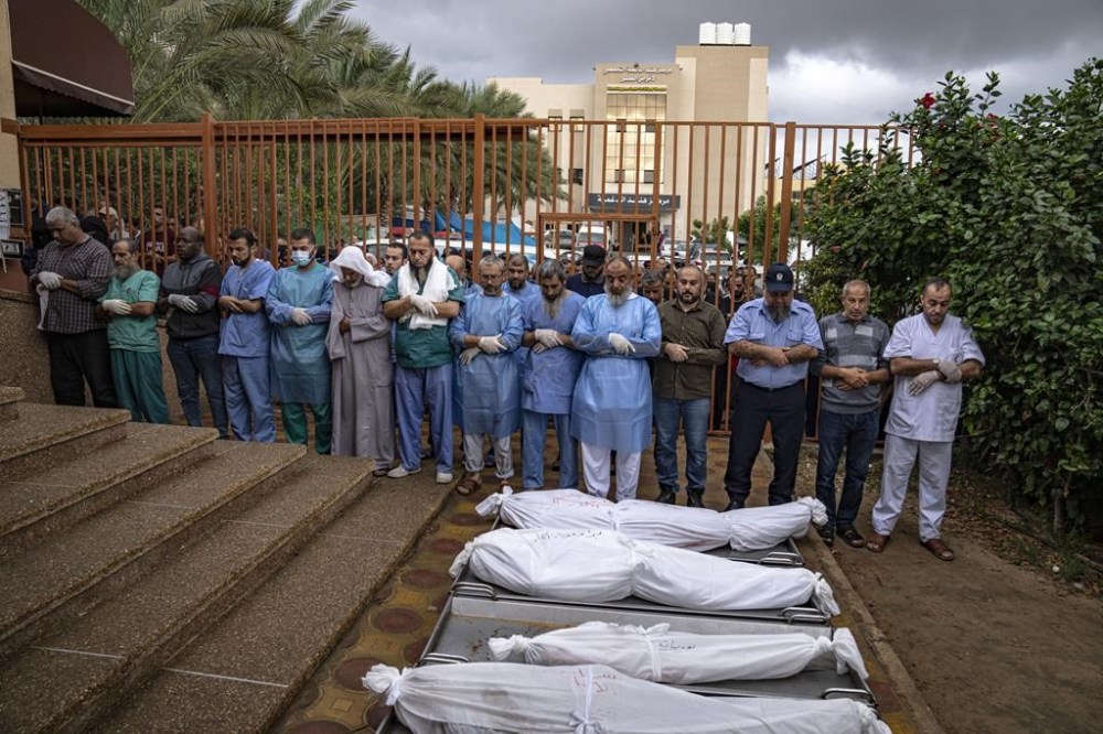 Palestinians mourn their relatives killed in the Israeli bombardment of the Gaza Strip, in the hospital in Khan Younis, Tuesday, Nov. 14, 2023. ( AP Photo/Fatima Shbair)