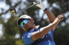 FILE - Japan's Ryo Hisatsune loses grip of his club after he tees off on the 11th hole during the Australian Open golf championship at Victoria golf course in Melbourne, Australia, on Dec. 2, 2022. A life-changing few days await a number of globally unrecognized players in Dubai this week as they head into the World Tour Championship with far more than winning the season-ending European tour event on their minds. (AP Photo/Asanka Brendon Ratnayake, File)