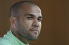 FILE - Brazil's Dani Alves listens to a question during a press conference on the eve of the group G of World Cup soccer match between Brazil and Cameroon in Doha, Qatar, on Dec. 1, 2022. Alves will face trial for allegedly having sexually assaulted a woman in a night club last year, a Spanish judge ordered Tuesday Nov. 14, 2023. (AP Photo/Andre Penner, File)