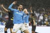 CORRECTS TO REACTS Napoli's Khvicha Kvaratskhelia reacts during the Serie A soccer match between Napoli and Empoli at the Diego Armando Maradona stadium in Naples, Italy, Sunday, Nov. 12, 2023. (Alessandro Garofalo/LaPresse via AP)