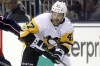 Pittsburgh Penguins forward Adam Johnson is shown in action during an NHL hockey game in Columbus, Ohio, Friday, Sept. 22, 2017. Police in Sheffield, England, say they have made an arrest in the death of hockey player Johnson. THE CANADIAN PRESS/AP/Paul Vernon