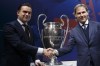 FILE - Marc Overmars, left, Director of Football of AFC Ajax, shakes hands with Pavel Nedved, Vice President of Juventus FC, at the UEFA headquarters in Nyon, Switzerland, Friday, March 15, 2019. Former Dutch soccer great Marc Overmars has been suspended one year from working in soccer in the Netherlands after admitting to sending inappropriate messages to female colleagues, it was announced Thursday, Nov. 16, 2023. Overmars relinquished his sports director role at Ajax last year and apologized for his behavior because of the scandal. (Salvatore Di Nolfi/Keystone via AP, file)