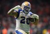 Winnipeg Blue Bombers' Brady Oliveira celebrates his rushing touchdown against the B.C. Lions during overtime CFL football action, in Vancouver, B.C., Friday, Oct. 6, 2023. THE CANADIAN PRESS/Darryl Dyck
