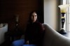 Rana Nassrawi sits in her home in Mississauga, Ont., Thursday, Nov. 16, 2023. Nassrawi is finally home from a harrowing journey after a trip to visit family in Gaza with her two youngest sons was interrupted by the outbreak of war. THE CANADIAN PRESS/Cole Burston