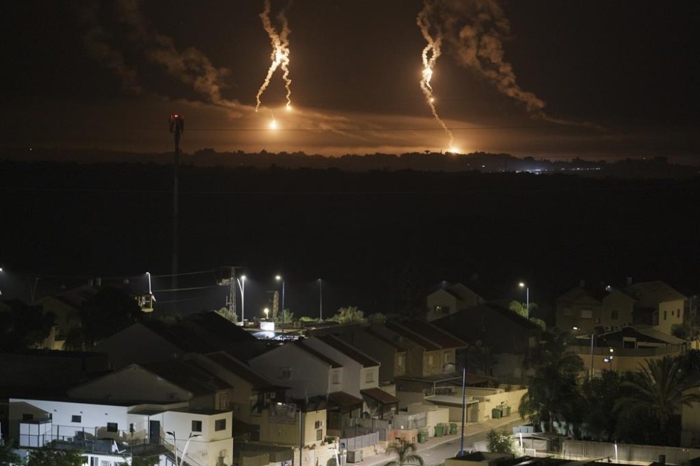 Global Affairs Canada says that to date, 367 Canadians, permanent residents and their relatives have been able to escape via the Rafah border crossing, most recently including two people on Wednesday and 10 on Monday. Flares rise over the Gaza Strip, as seen from southern Israel, Thursday, Nov. 16, 2023. THE CANADIAN PRESS/AP-Leo Correa