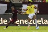 Ecuador's Kevin Rodriguez, right, and Venezuela's Christian Makoun, compete for the ball during a FIFA World Cup 2026 qualifying soccer match at the Monumental de Maturin Stadium in Maturin, Venezuela, Thursday, Nov. 16, 2023. (AP Photo/Ariana Cubillos)