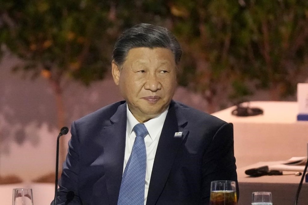 Chinese President Xi Jinping sits next to other world leaders during the Asia-Pacific Economic Cooperation (APEC) conference in San Francisco, Thursday, Nov. 16, 2023. (AP Photo/Jeff Chiu)