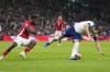 England's Harry Kane, right, challenges for the ball with Malta's Joseph Mbong during the Euro 2024 group C qualifying soccer match between England and Malta at Wembley stadium in London, Friday, Nov. 17, 2023. (AP Photo/Kirsty Wigglesworth)