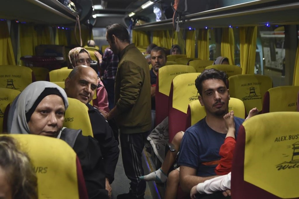 A new batch of people with ties to Canada desperate to flee escalating violence in the Gaza Strip has been approved to leave the besieged territory as of today. Palestinians with Canadian passports who were evacuated from Gaza sit in a bus at the Rafah border crossing in Egypt, late Sunday, Nov. 12, 2023. THE CANADIAN PRESS/AP-Tarek Wajeh