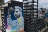 A mural depicting soccer legend Lionel Messi, by artist Martin Ron, adorns a building on the 9 de Julio avenue in Buenos Aires, Argentina, Saturday, Nov. 18, 2023. (AP Photo/Matias Delacroix)