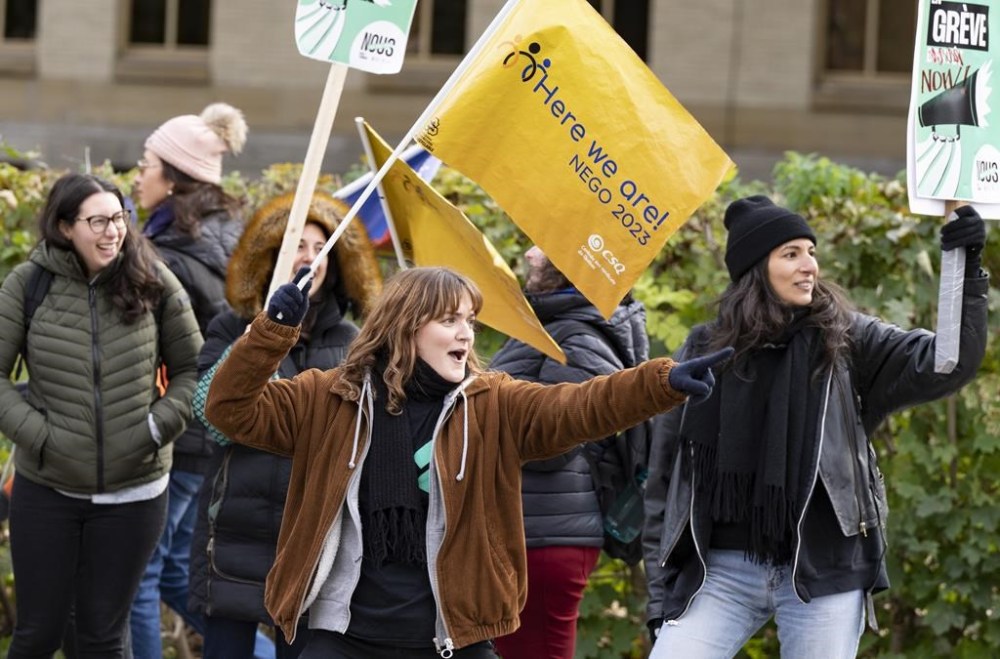 Ahead of a week of public sector strikes in Quebec, the province's treasury board president implored unionized workers to table a counter-offer to its last contract proposal. Quebec public sector workers in health, education and social services hold a one-day strike in Montreal, Monday, Nov. 6, 2023. THE CANADIAN PRESS/Christinne Muschi