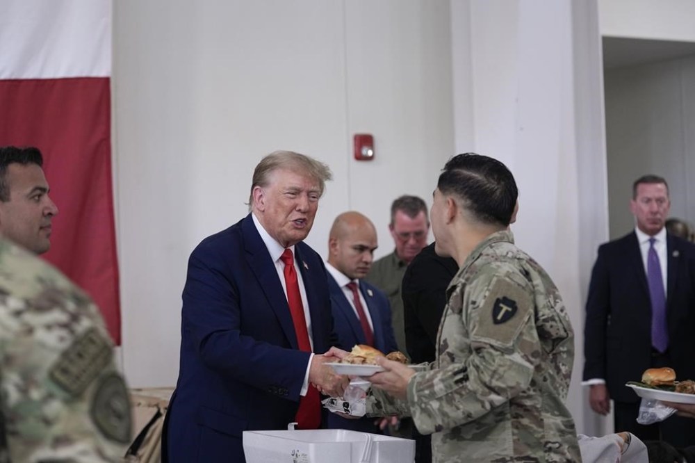 Trump picks up the endorsement of Texas Gov. Greg Abbott during a visit ...
