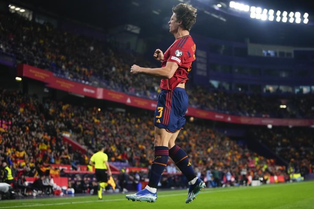 Spain's Robin Le Normand reacts after scoring his team's first goal during the Euro 2024 group A qualifying soccer match between Spain and Georgia at Jose Zorrilla Stadium in Valladolid, Spain, Sunday, Nov. 19 23, 2023. (AP Photo/Manu Fernandez)