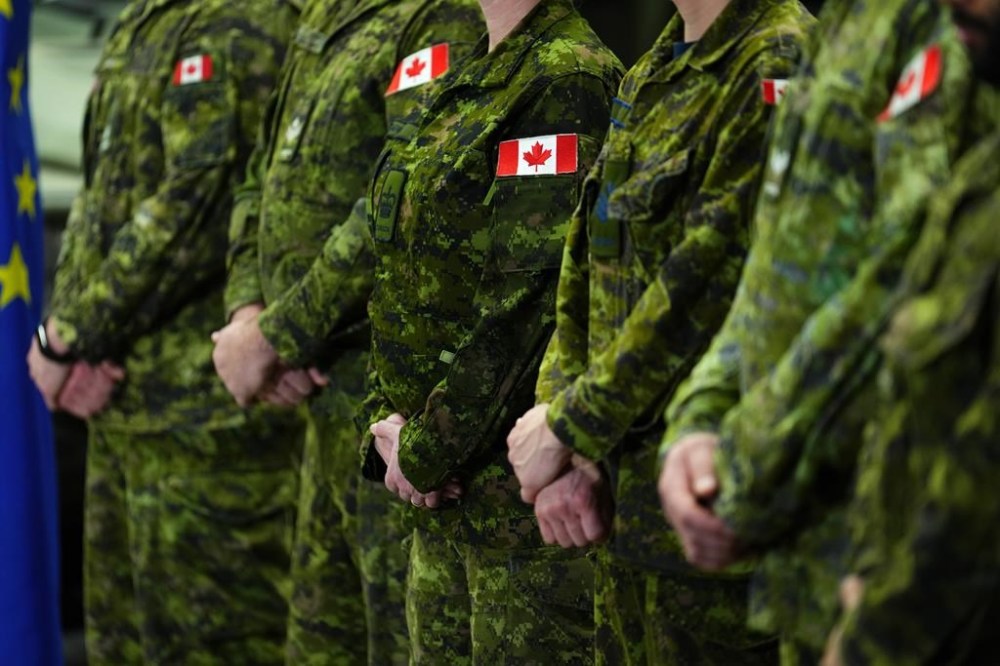 The military is finalizing a policy change to abolish its definition of sexual misconduct and to use the Criminal Code definition for sexual assault. Canadian Forces personnel stand easy during a government event at CFB Kingston in Kingston, Ont., Tuesday, March 7, 2023. THE CANADIAN PRESS/Sean Kilpatrick