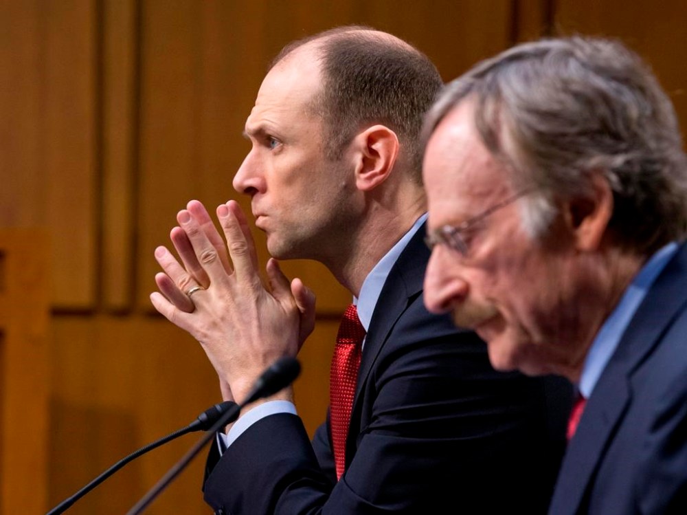 FILE - Austan Goolsbee, left, then Council of Economic Advisers Chairman, testifies on Capitol Hill in Washington on Feb. 28, 2013. Now president of the Federal Reserve Bank of Chicago, Goolsbee said in an interview with The Associated Press that the economy was still on what he calls the