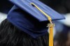 Ontario's colleges want the province to immediately end its five-year-long tuition freeze. A tassel with 2023 on it rests on a graduation cap as students walk in a procession for Howard University's commencement in Washington, Saturday, May 13, 2023. THE CANADIAN PRESS/AP/Alex Brandon