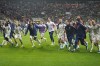 Italy players celebrate their qualifying after the Euro 2024 group C qualifying soccer match between Ukraine and Italy at the BayArena in Leverkusen, Germany, Monday, Nov. 20, 2023. (AP Photo/Martin Meissner)