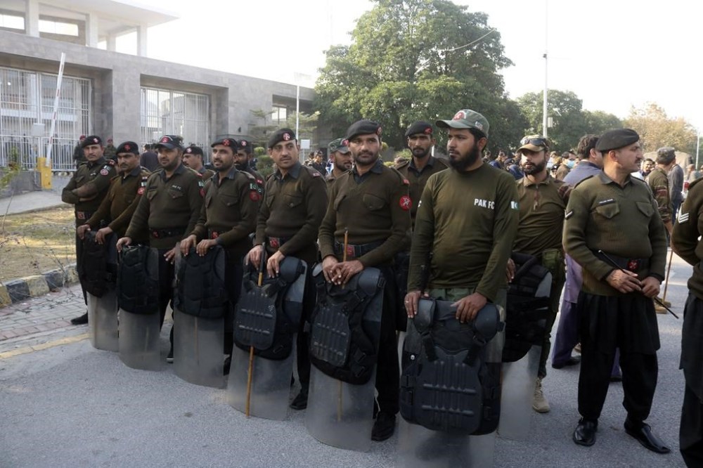 Security personnels stand guard outside Islamabad High Court, in Islamabad, Pakistan, Tuesday, Nov. 21, 2023. A court in Islamabad briefly heard an appeal from former Prime Minister Imran Khan's main political rival, Nawaz Sharif, against his 2018 conviction in a graft case. Sharif, who served as prime minister three times, returned to Pakistan in October, ending four years of self-imposed exile in London mainly to lead his Pakistan Muslim League party in the parliamentary elections. (AP Photo/W.K. Yousafzai)