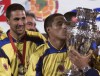 Canada will have to win a play-in match in March to get to Copa America for the first time, thanks to Tuesday's quarterfinal loss to Jamaica in the CONCACAF Nations League. Colombia's defender Mario Yepes, left, watches striker Ivan Cordoba kissing the Copa America trophy after the Copa America final game in Bogota, Sunday, July 29, 2001. Cordoba scored the goal to defeat Mexico 1-0. THE CANADIAN PRESS/AP-Daniel Jayo