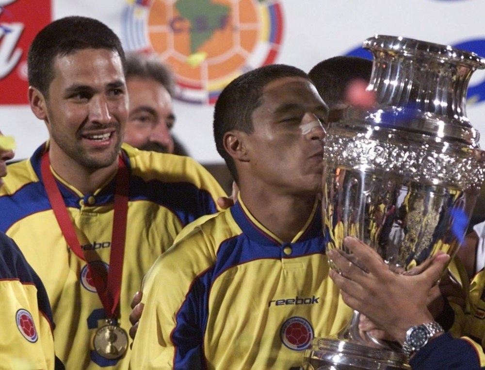 Canada will have to win a play-in match in March to get to Copa America for the first time, thanks to Tuesday's quarterfinal loss to Jamaica in the CONCACAF Nations League. Colombia's defender Mario Yepes, left, watches striker Ivan Cordoba kissing the Copa America trophy after the Copa America final game in Bogota, Sunday, July 29, 2001. Cordoba scored the goal to defeat Mexico 1-0. THE CANADIAN PRESS/AP-Daniel Jayo