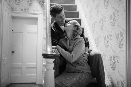 This image released by Netflix shows Carey Mulligan as Felicia Montealegre, right, and Bradley Cooper as Leonard Bernstein in a scene from 
