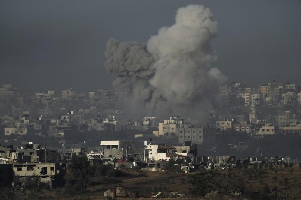 Smoke rises following an Israeli airstrike in the Gaza Strip, as seen from southern Israel, Wednesday, Nov. 22, 2023. (AP Photo/Leo Correa)