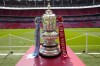 FILE - The FA Cup trophy is seen before the English FA Cup final soccer match between Manchester City and Manchester United at Wembley Stadium in London, Saturday, June 3, 2023. Barnsley was expelled from this season’s FA Cup on Wednesday after it fielded an ineligible player in professional soccer’s oldest knockout competition. The English division three team said an “administrative error” was to blame for fielding the unnamed player in its first round replay against Horsham. (AP Photo/Jon Super, File)