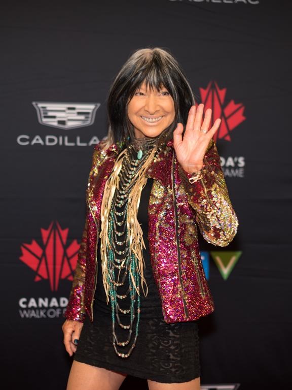 Award-winning singer-songwriter Buffy Sainte-Marie poses for a photograph on the red carpet for the 2022 Canada’s Walk of Fame Gala in Toronto, on Saturday, Dec.3, 2022. Sainte-Marie is pushing back on a report that questions her Indigenous heritage, maintaining she has never lied about her identity.THE CANADIAN PRESS/ Tijana Martin