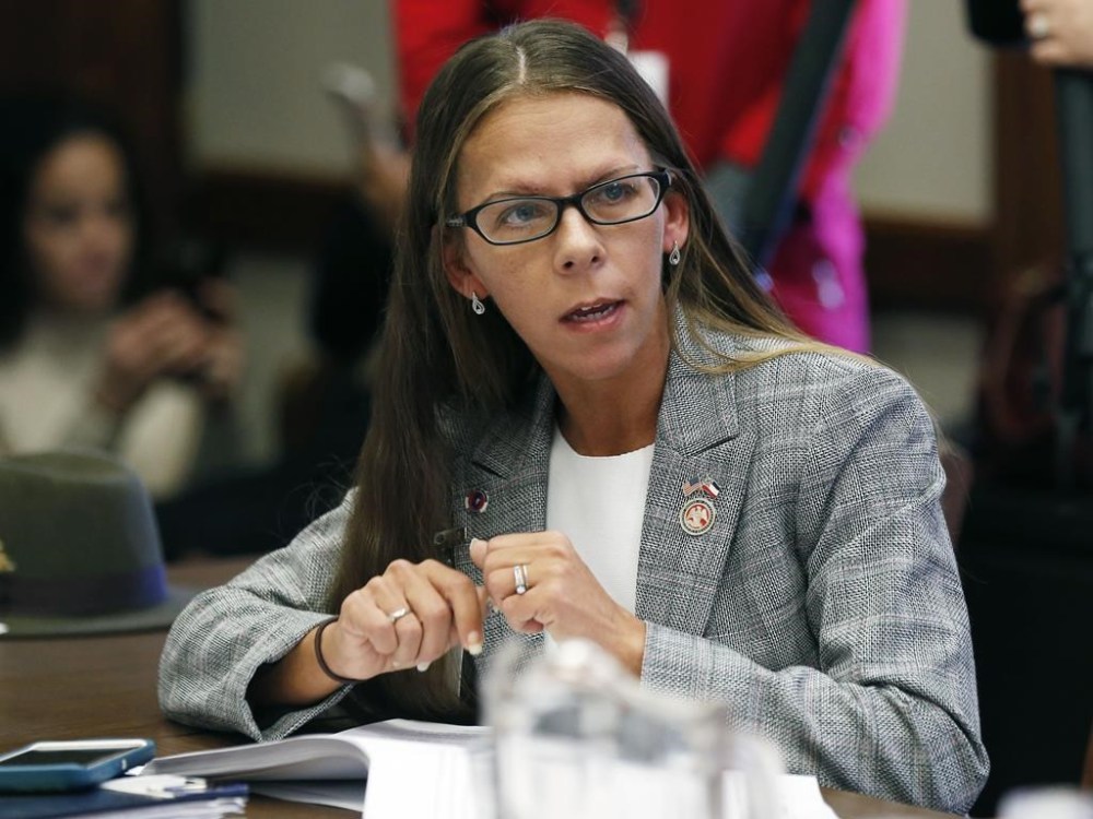 FILE - House Education Committee member Ashley Henley, R-Southaven, asks a question about teacher pay raise legislation presented before the committee on Jan. 31, 2019, at the Capitol in Jackson, Miss. On Nov. 17, 2023, a judge signed an order to drop indictments on murder and arson against Billy Lamar Brooks in the June 2021 death of Henley and the earlier burning of a building. Prosecutors saying they needed more time to investigate, and new charges could be brought later. Henley served in the Mississippi House from 2016 to 2020. (AP Photo/Rogelio V. Solis, File)