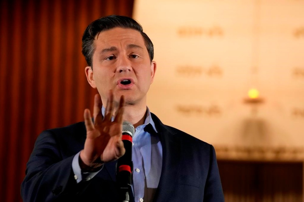 Conservative Leader Pierre Poilievre speaks during a press conference at the Shaarei Shomayim Congregation in Toronto on Thursday Nov. 23, 2023. Poilievre says his party didn't vote against having a free-trade agreement with Ukraine but rather rejected a bill that promotes a carbon tax.THE CANADIAN PRESS/Frank Gunn