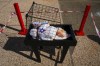 An installation of a baby and a pillow with the Hebrew writing 