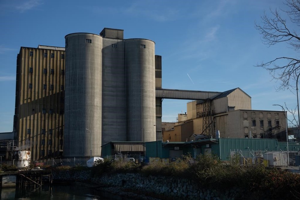 Rogers Sugar Inc. says it has asked for mediation to help bring an end to an eight-week long strike at its Vancouver refinery. The Rogers Sugar refinery is seen in Vancouver on Thursday, Nov. 16, 2023. THE CANADIAN PRESS/Ethan Cairns