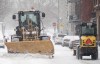A plow clears a street during a snowstorm in Montreal, Tuesday, Feb. 28, 2023. THE CANADIAN PRESS/Graham Hughes