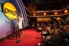 Stand-up comedian and actress Tiffany Haddish, left, entertains guests at Laugh Factory Hollywood, which provided free Thanksgiving meals Thursday, Nov. 23, 2023, in Los Angeles. (AP Photo/Damian Dovarganes)