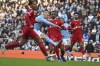 Manchester City's Erling Haaland scores his side's opening goal during the English Premier League soccer match between Manchester City and Liverpool at Etihad stadium in Manchester, England, Saturday, Nov. 25, 2023. (AP Photo/Rui Vieira)