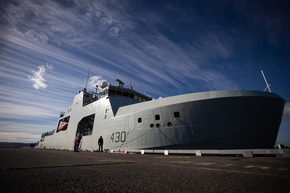 The Royal Canadian Navy's newest Arctic and Offshore Patrol Ship, HMCS Harry DeWolf, docks in Victoria on Sunday, October 3, 2021. An outbreak of COVID-19 aboard a Canadian warship has forced the Royal Canadian Navy to cancel the remainder of a tour of the Great Lakes and the St. Lawrence Seaway.THE CANADIAN PRESS/Darryl Dyck
