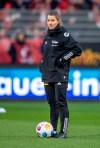 Berlin's assistant coach Marie-Louise Eta is on the pitch before the German Bundesliga soccer match between 1. FC Union Berlin and FC Augsburg in Berlin, Germany, Saturday, Nov. 25, 2023. (Andreas Gora/dpa via AP)
