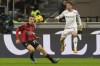 AC Milan's Francesco Camarda challenges for the ball with Fiorentina's Maxime Lopez during a Serie A soccer match between AC Milan and Fiorentina, at the San Siro stadium in Milan, Italy, Saturday, Nov. 25, 2023. (AP Photo/Luca Bruno)