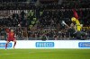 Roma's Stephan El Shaarawy, left, scores his isdes third goal past Udinese's goalkeeper Marco Silvestri during the Italian Serie A soccer match between Roma and Udinese at Rome's Olympic Stadium, Italy, Sunday, Nov. 26, 2023. (AP Photo/Alessandra Tarantino)